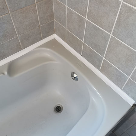 sealing tape around bath tub or shower