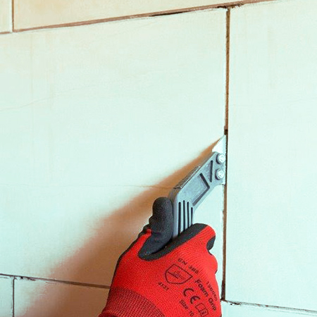 REPAIR GROUT LINES WITH A GROUT RAKE