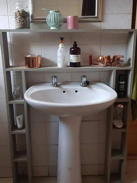 build storage around pedestal sink