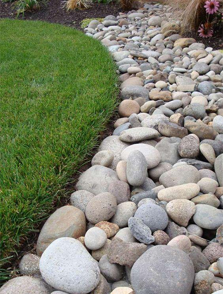 pebbles around edge of lawn
