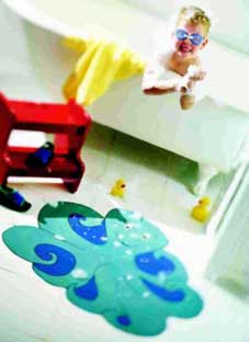 A painted floorcloth will add a splash of colour to any bathroom
