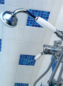 Use mosaic tiles throughout the bathroom, including the shower