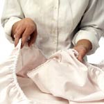 There's an easy way to folding fitted sheets