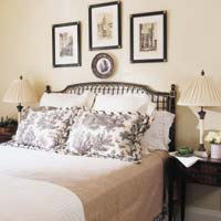 Period French furniture and toile fabrics combine to create a romantic ambience
