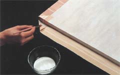Apply spray adhesive to wrong side of fabric for outside of lid