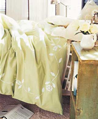 Add your own artwork with fabric paints to a plain comforter