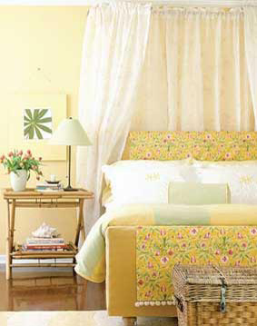 Pure white bedding, including a knit blanket instead of a bulky comforter, keeps the look crisp and spring-like
