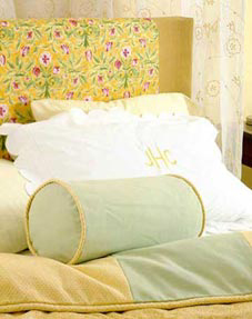 Cottons and linens bring crisp, cool texture to the bed