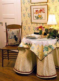 You can add drama and elegance to any room in the home with a skirted table