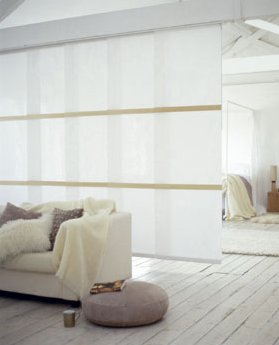 Use panel blinds to create a stylish room division
