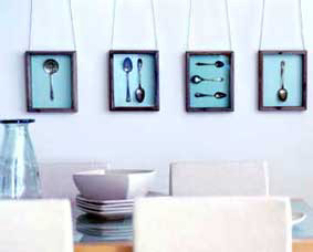 A contemporary arrangement of collected spoons adds a colourful feature to this plain wall