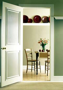 Use paint effects and trim to add interest to interior doors