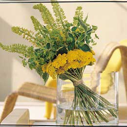 Bring a touch of sunshine into your home with this floral arrangement