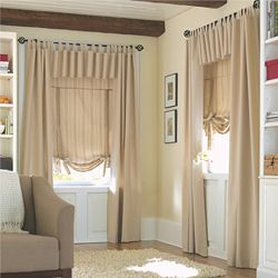 For a less formal look use tab-top curtains