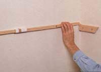 Use scrap timber to mark the position