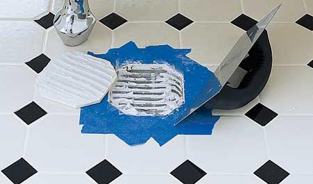 replace a broken floor tile