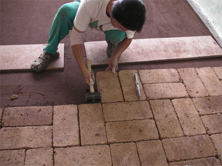Clay brick floors lay bricks