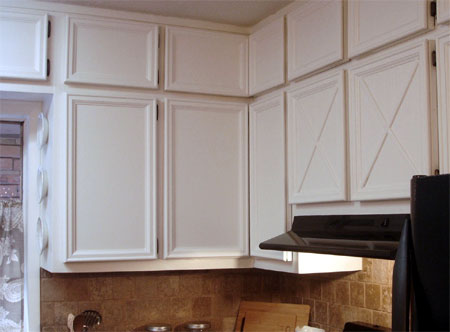Add moulding and trim to cabinets