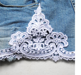 Lace-trimmed jean shorts 