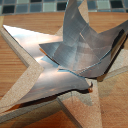 Make a patchwork tin star 
