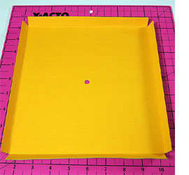 Colourful clock with embossed detail 