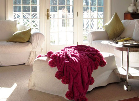 Make a pom-pom trimmed throw