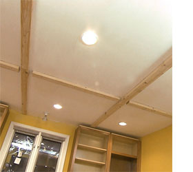 Installing a mock beam ceiling