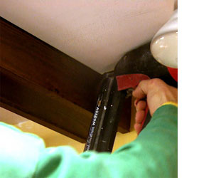 Installing a mock beam ceiling