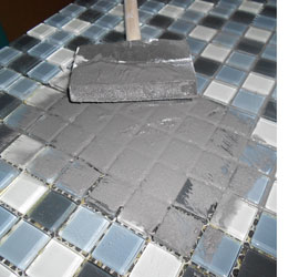 Apply mosaic tile to kitchen countertops 