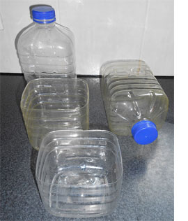 Repurpose plastic bottles into flower pots