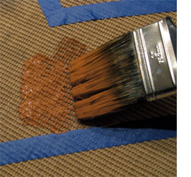 Paint an old rug with chevron stripes 