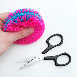 how to make a colourful pom pom rug