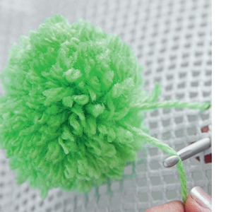 how to make a colourful pom pom rug