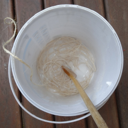 Extra large string lampshade using pilates ball or large balloon soaking twine in glue and water mix