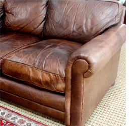 Fix flat cushions on a leather sofa