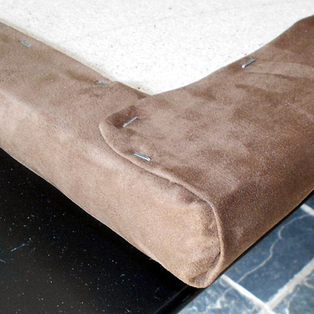 corners on upholstered headboard