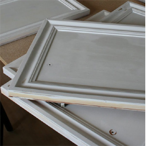 Update wood kitchen cabinets with moulding and trim
