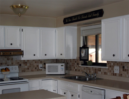 Update wood kitchen cabinets with moulding and trim