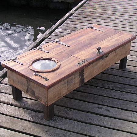 door salvaged from an old fishing boat  into a storage coffee table