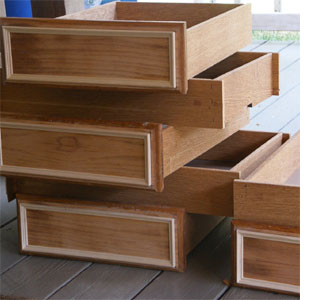 Update wood kitchen cabinets with moulding and trim