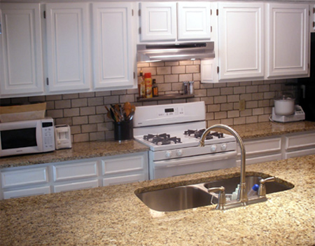 Update wood kitchen cabinets with moulding and trim