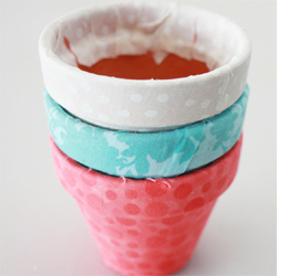 Fabric covered plant pots add a splash of colour 