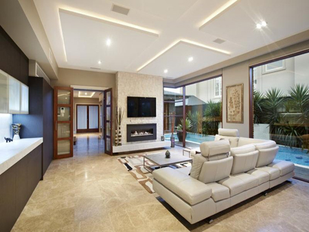 living area with built in fireplace