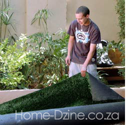 unrolling artificial turf