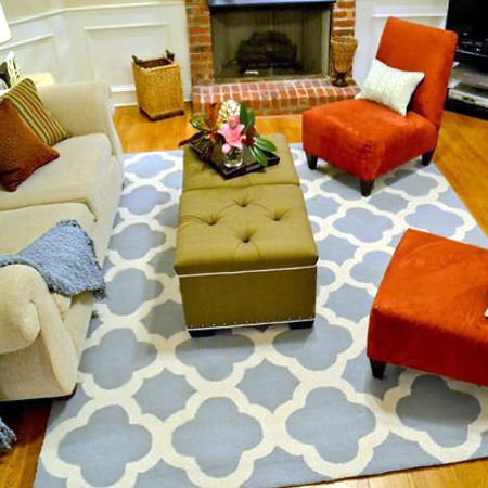 Use acrylic paint to stencil design on a rug or mat