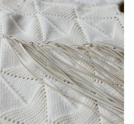 tassled jersery jumper sweater with tassles