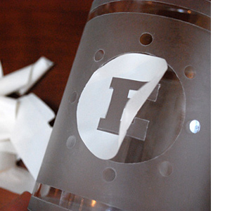 Etch a design onto a glass vase 