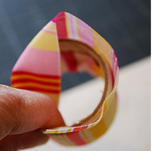 Make serviette rings from cardboard tubes
