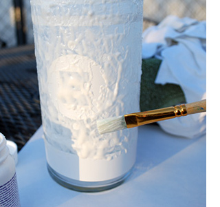Etch a design onto a glass vase 