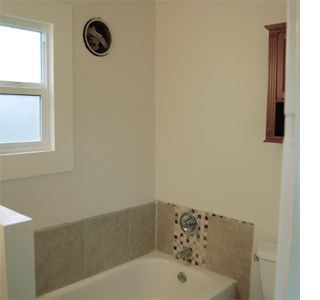 Dress up a bathroom wall with stripes